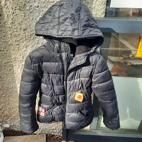 Manteau noir tape à l'œil 10 ans