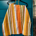 Tablier rayé orange/vert
