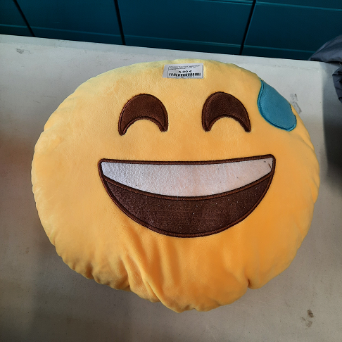 coussin emoji smile et sueur
