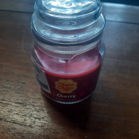 bougie entamee chuper chups cerise