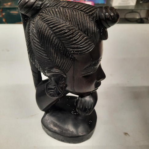 Tête de femme en bois origine Sénégal
